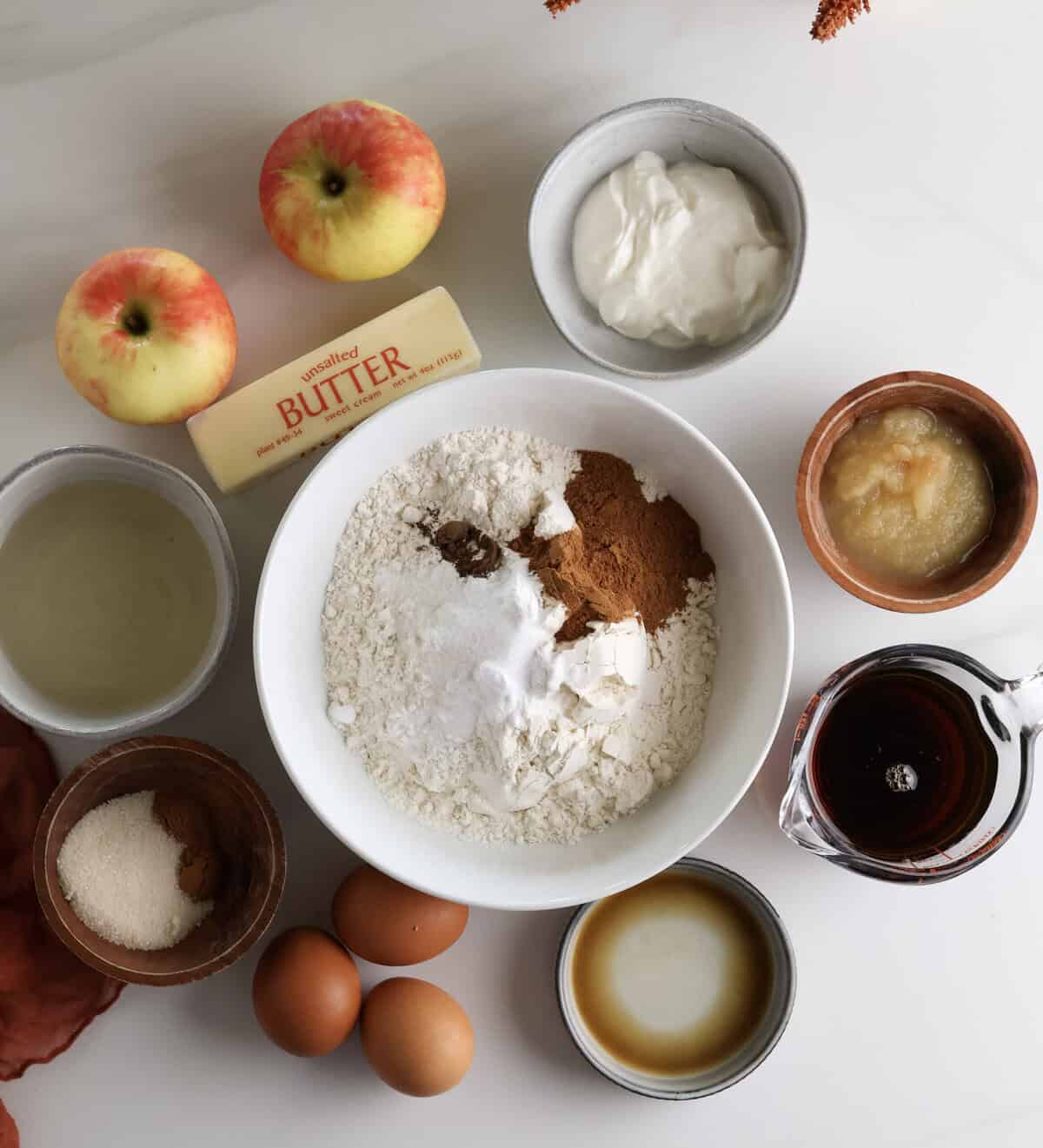 Ingredients for moist apple bread with cinnamon sugar butter. 