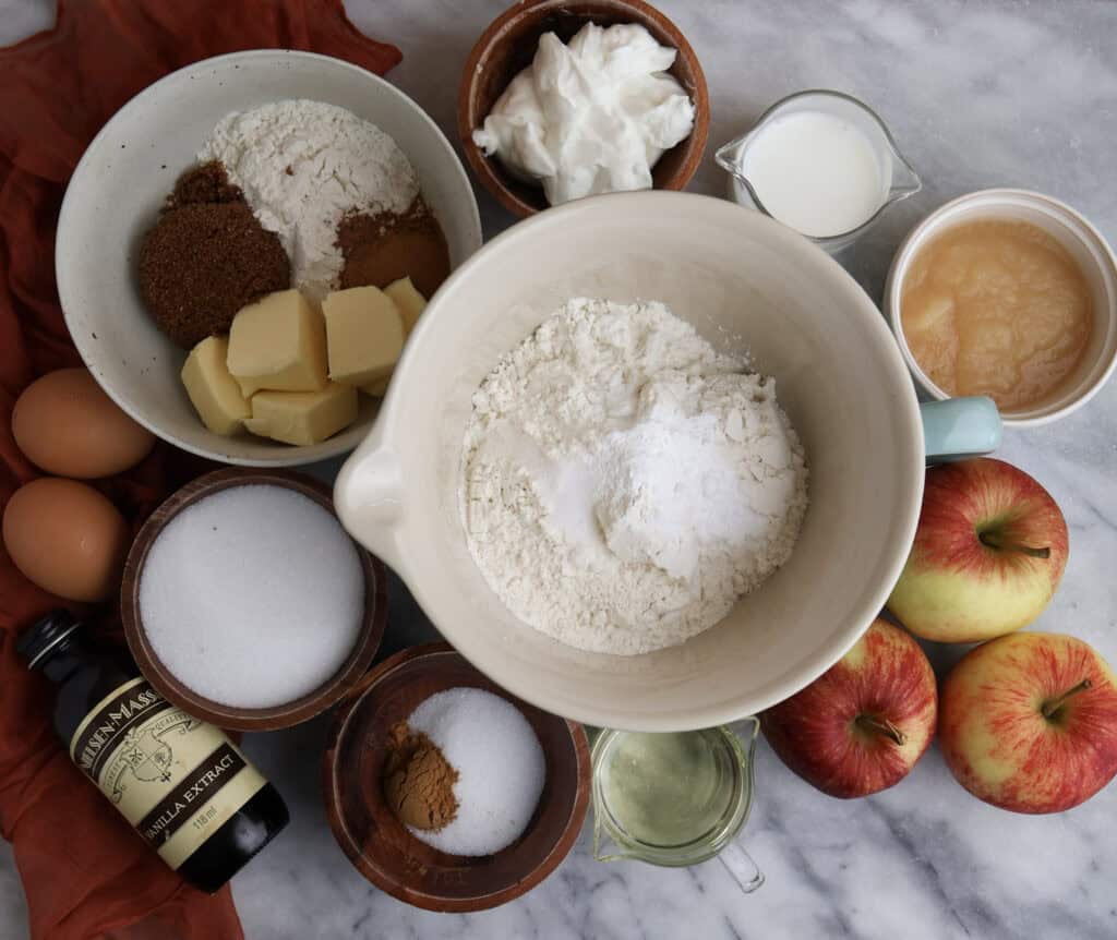 The ingredients needed to make the apple coffee cake with crumb topping om the counter. 