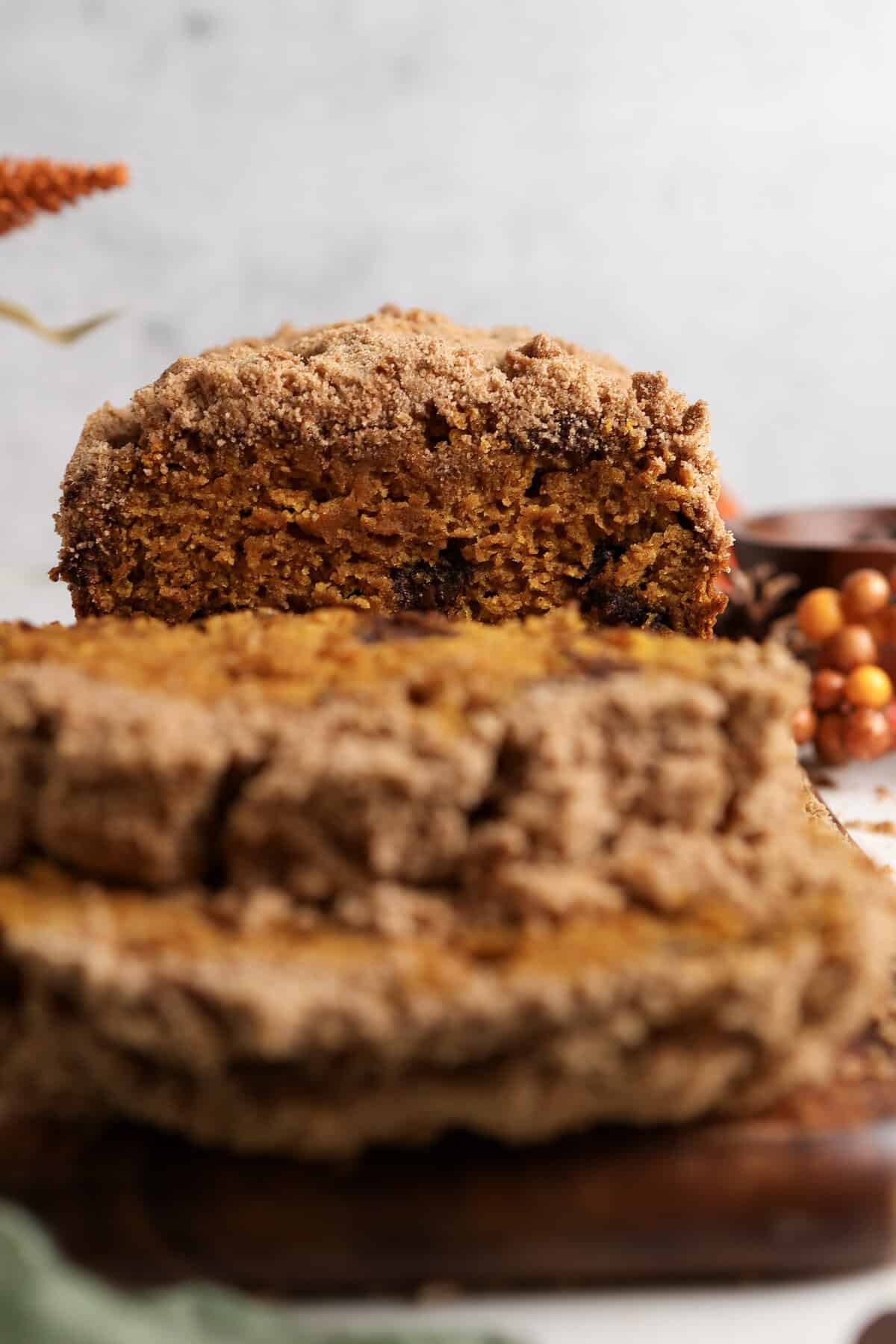 Up close of sliced pumpkin chocolate chip bread on a cutting board. 