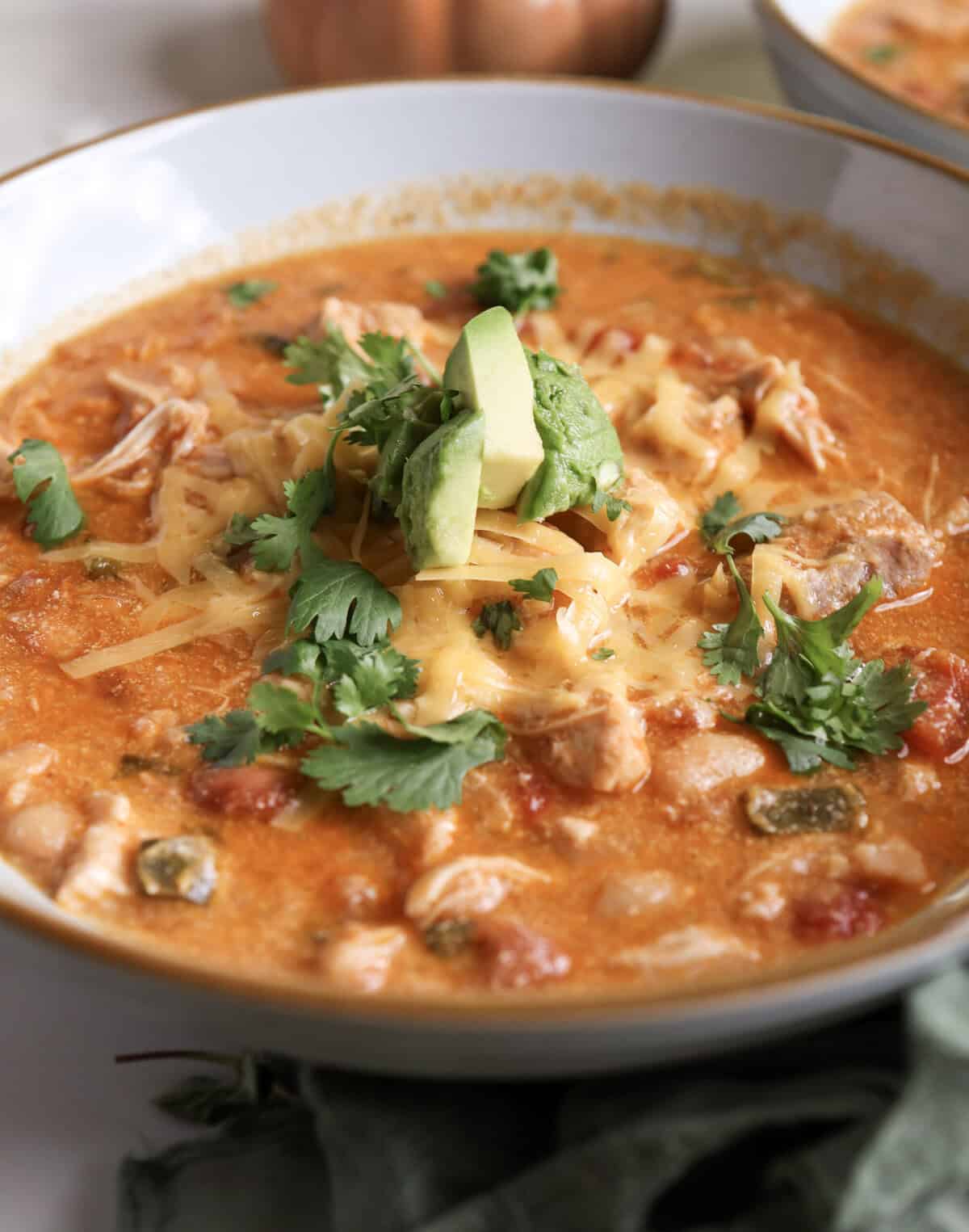 Up close shot of a bowl of buffalo chicken chili.