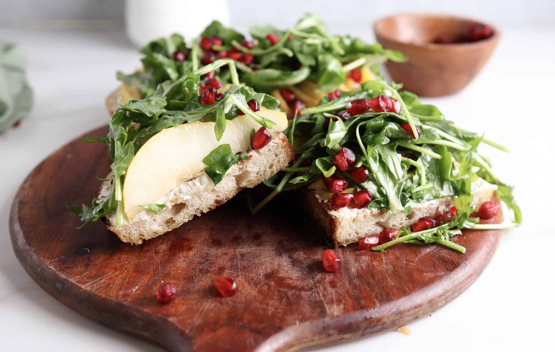 Pear and Goat Cheese Toast with Arugula and Pomegranate