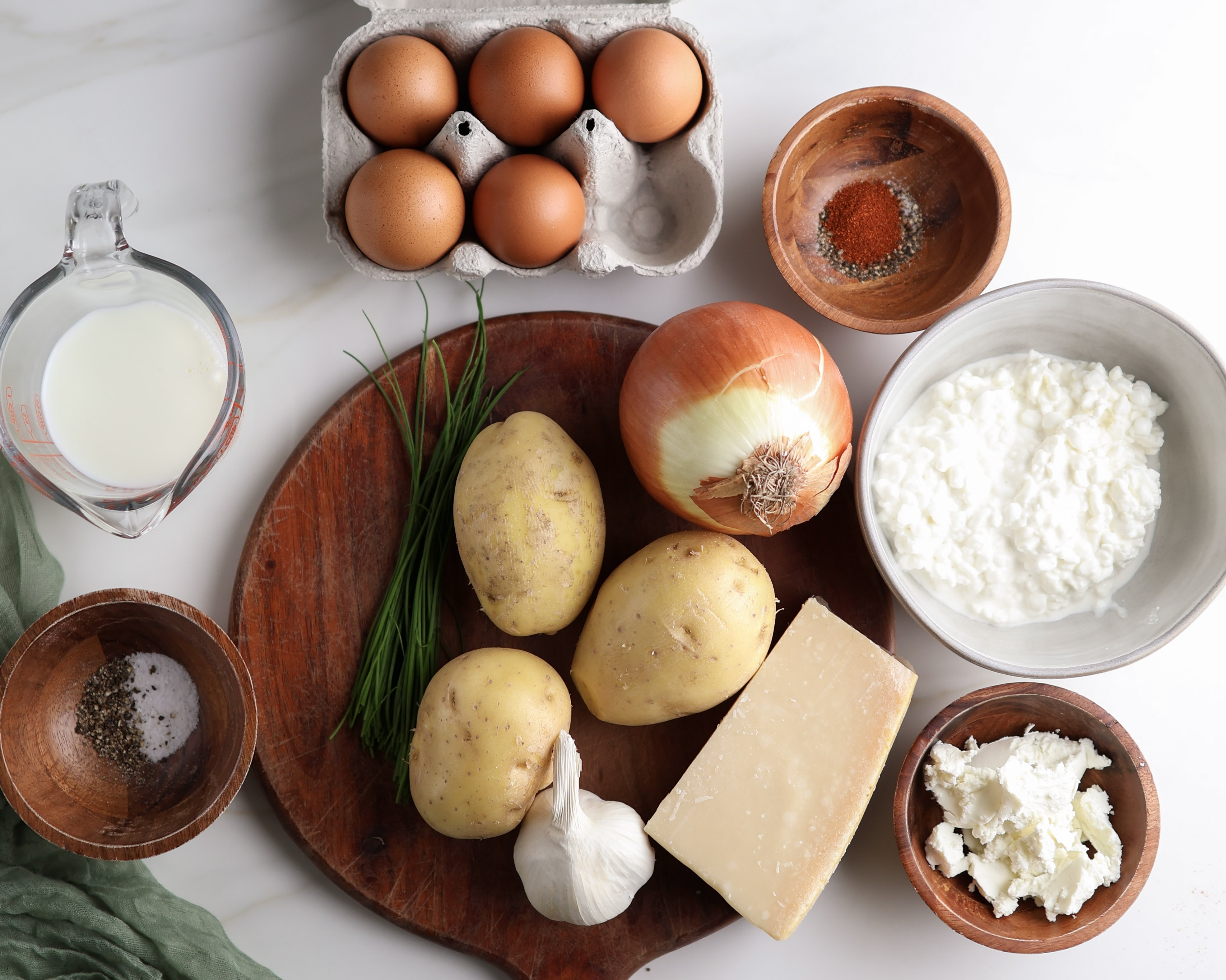 All the ingredients laid out to make the egg bites with cottage cheese and potatoes. 
