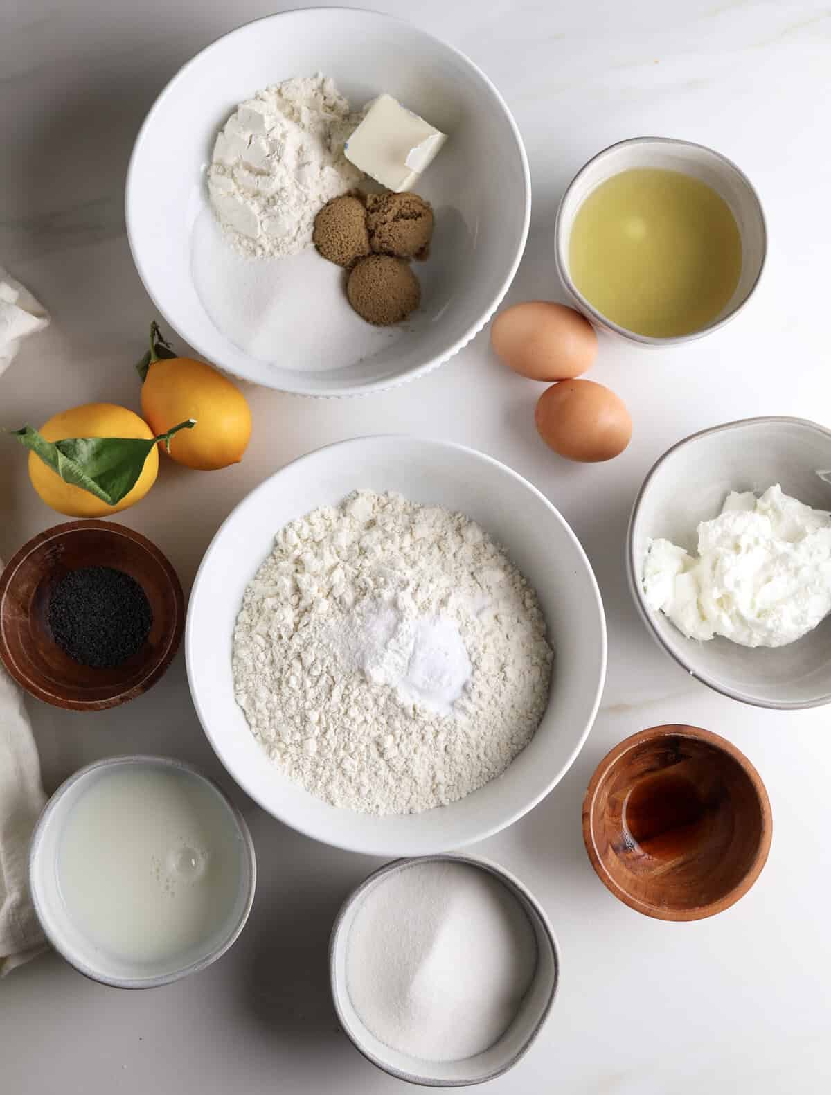 The ingredients needed to make the lemon poppy seed muffins.