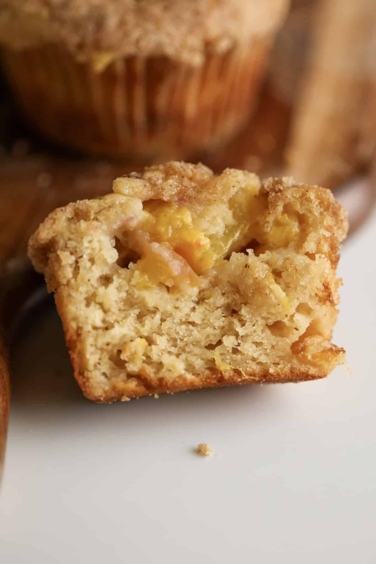 Brown Butter and Peach Muffin cut open.