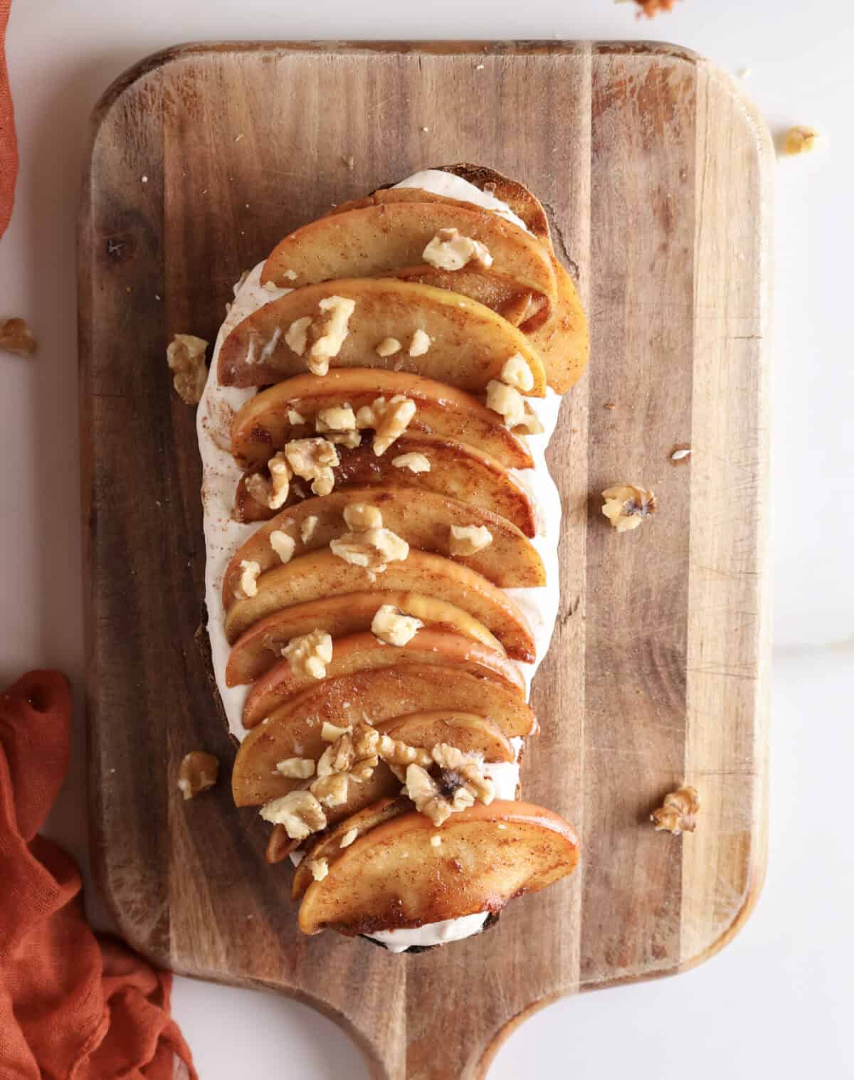 High Protein Apple Toast with Greek Yogurt on a cutting board.