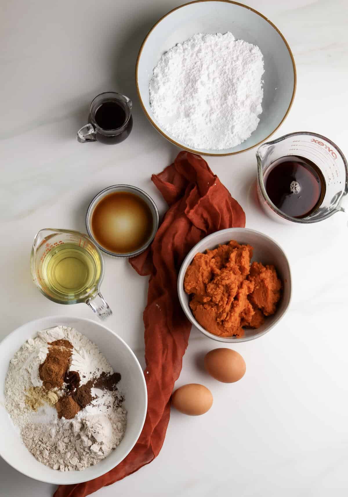 Ingredients for the spiced pumpkin bread with cinnamon glaze.