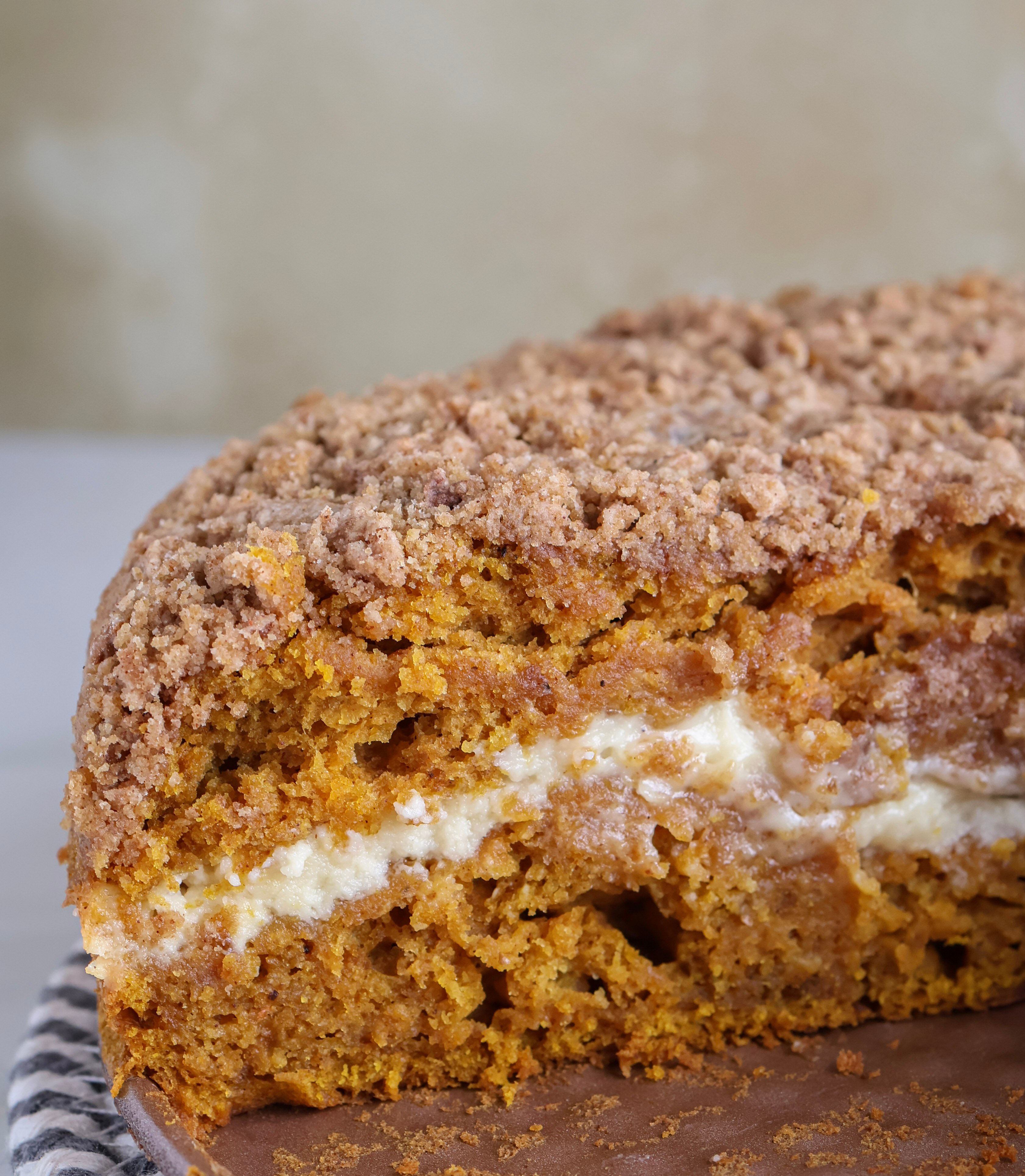 An up close shot of the pumpkin coffee cut into, revealing the cream cheese center