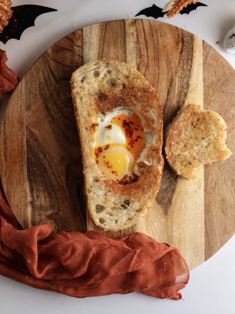 Spooky Halloween Eggs in a Hole with Parmesan and Chili Oil