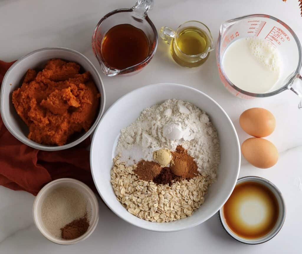 Ingredients laid out for the spiced pumpkin oatmeal bake. 