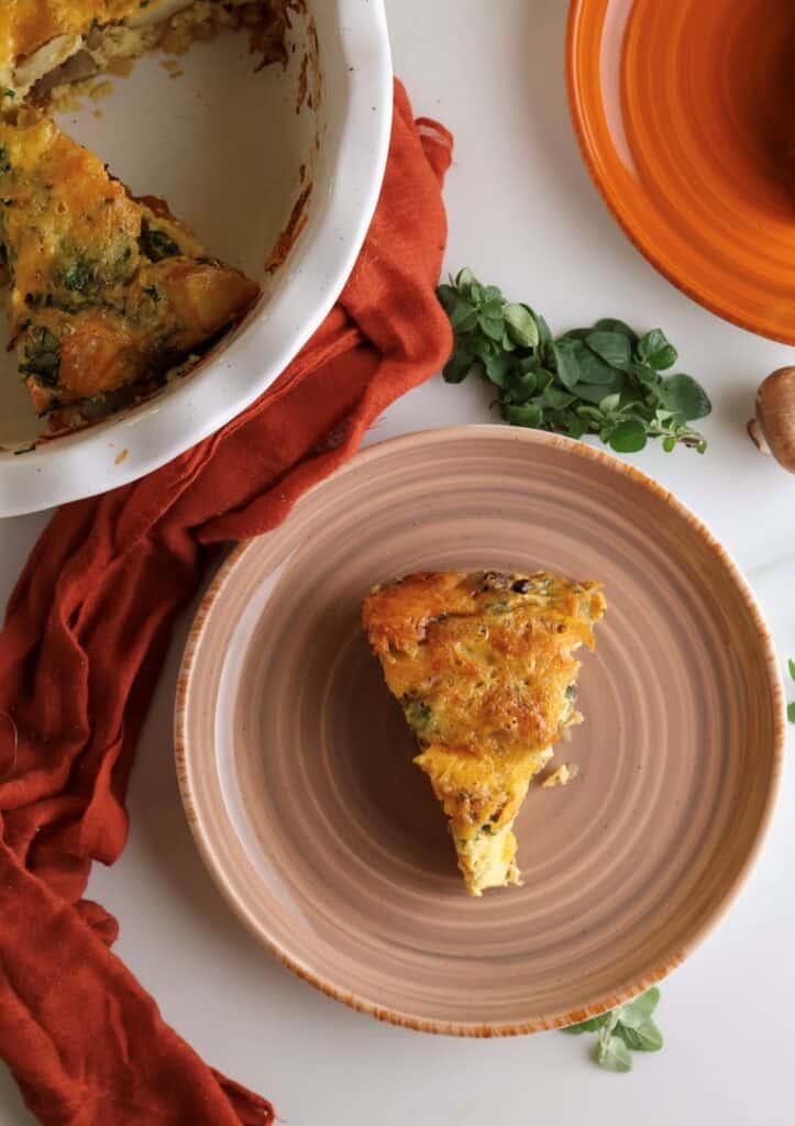 Slice of roasted potato breakfast casserole on a plate.