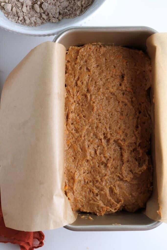 Sweet potato bread batter in a loaf before being baked.