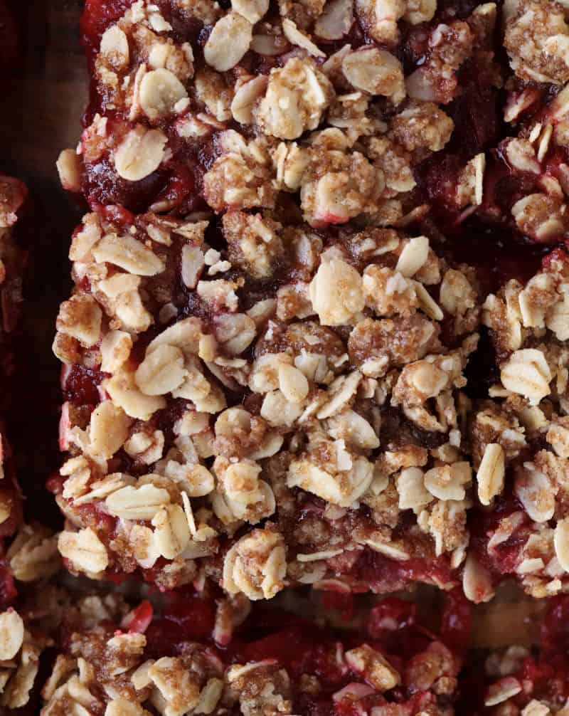 up close shot of cooked cranberry and orange oatmeal bars.