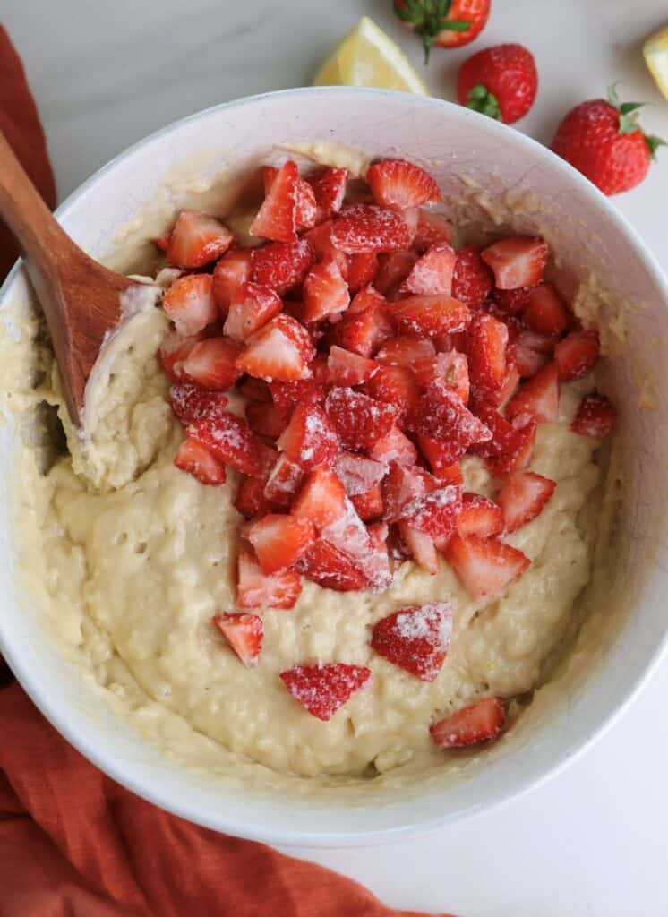 Diced strawberries in the lemon batter.