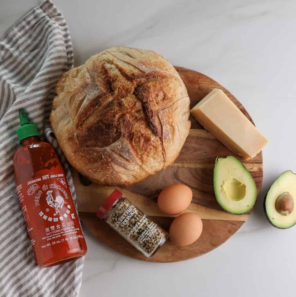 The ingredients to make the spicy avocado toast with fried egg.