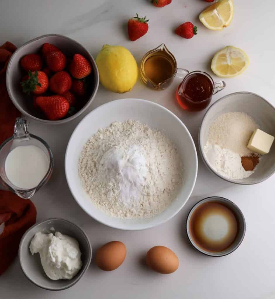 The ingredients used to make the strawberry lemon muffins.