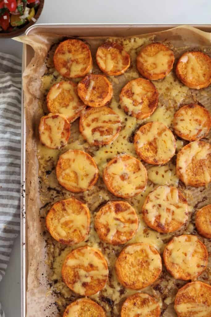 Cheesy roasted sweet potatoes for sweet potato breakfast bowls.