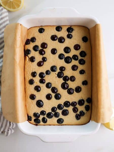 Lemon blueberry baked oatmeal in pan fresh from the oven.
