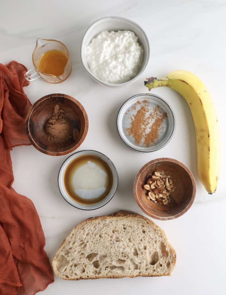 The ingredients needed to make the chocolate cottage cheese mousse toast.