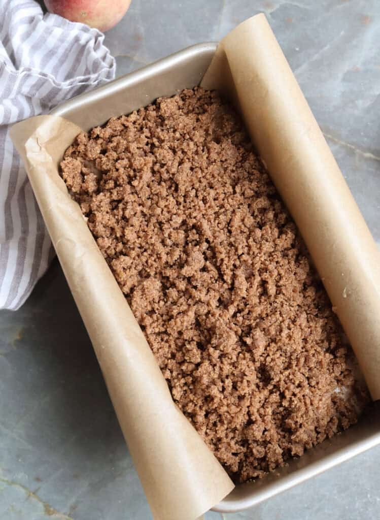 Peach Cobbler Bread in a loaf pan before baking.
