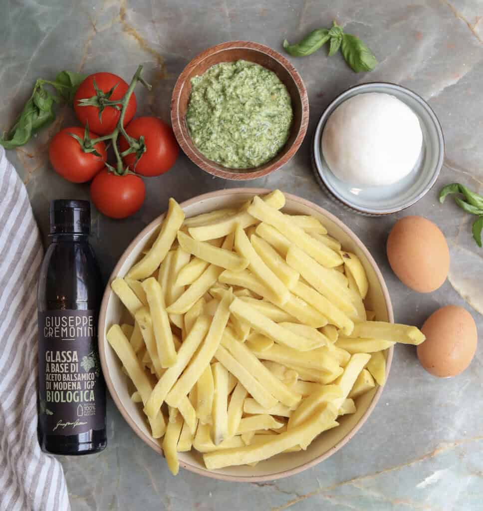 The ingredients needed to make the caprese breakfast fries with pesto fried egg.