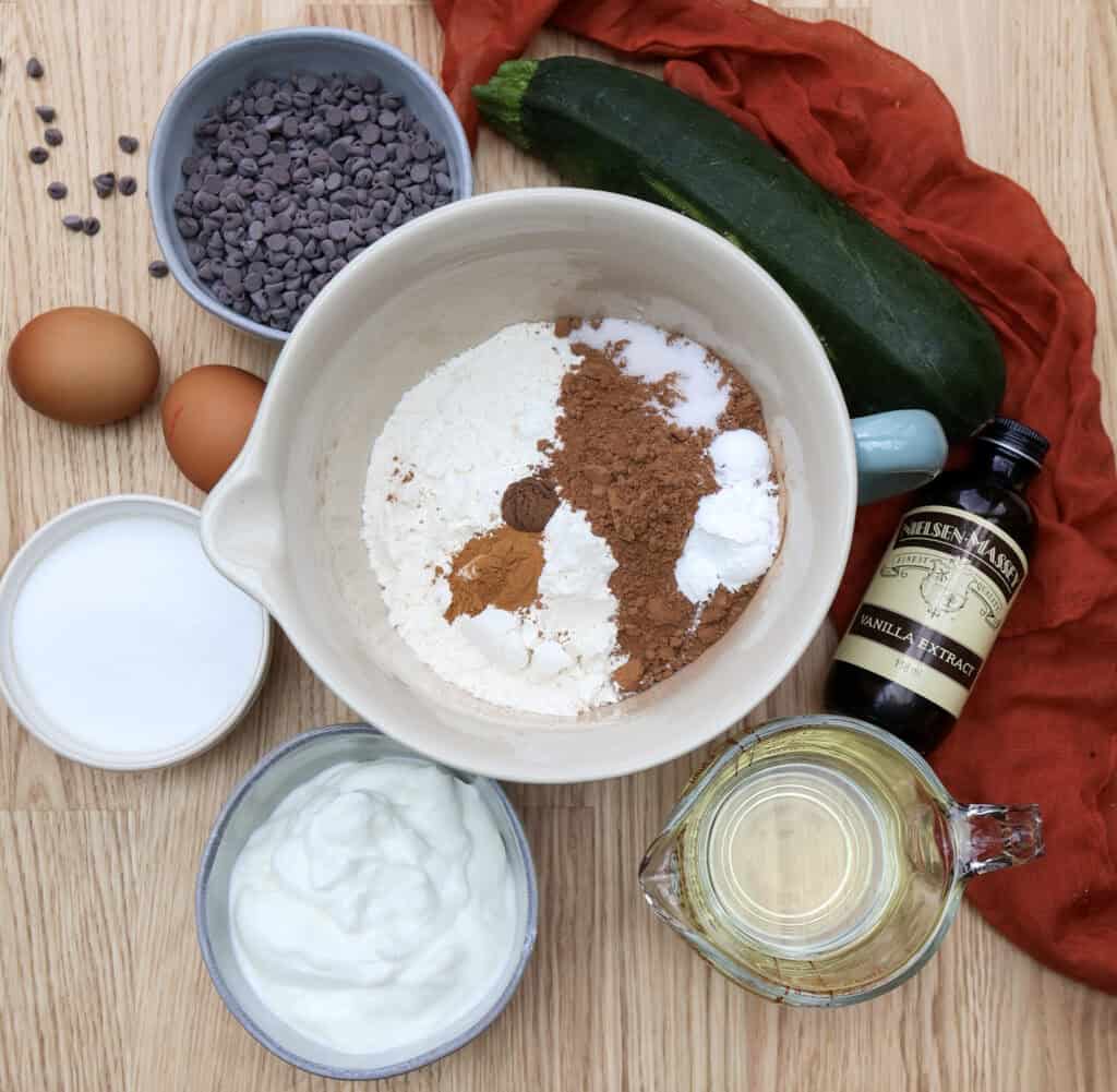 The ingredients to make double chocolate zucchini muffins. 