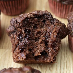 Double Chocolate Zucchini muffin up close with bite.