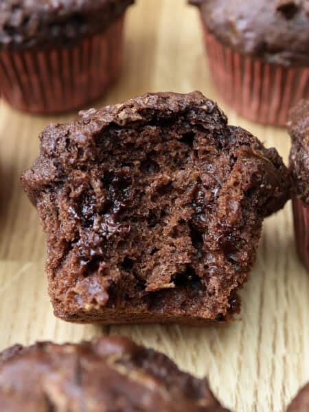Double Chocolate Zucchini muffin up close with bite.