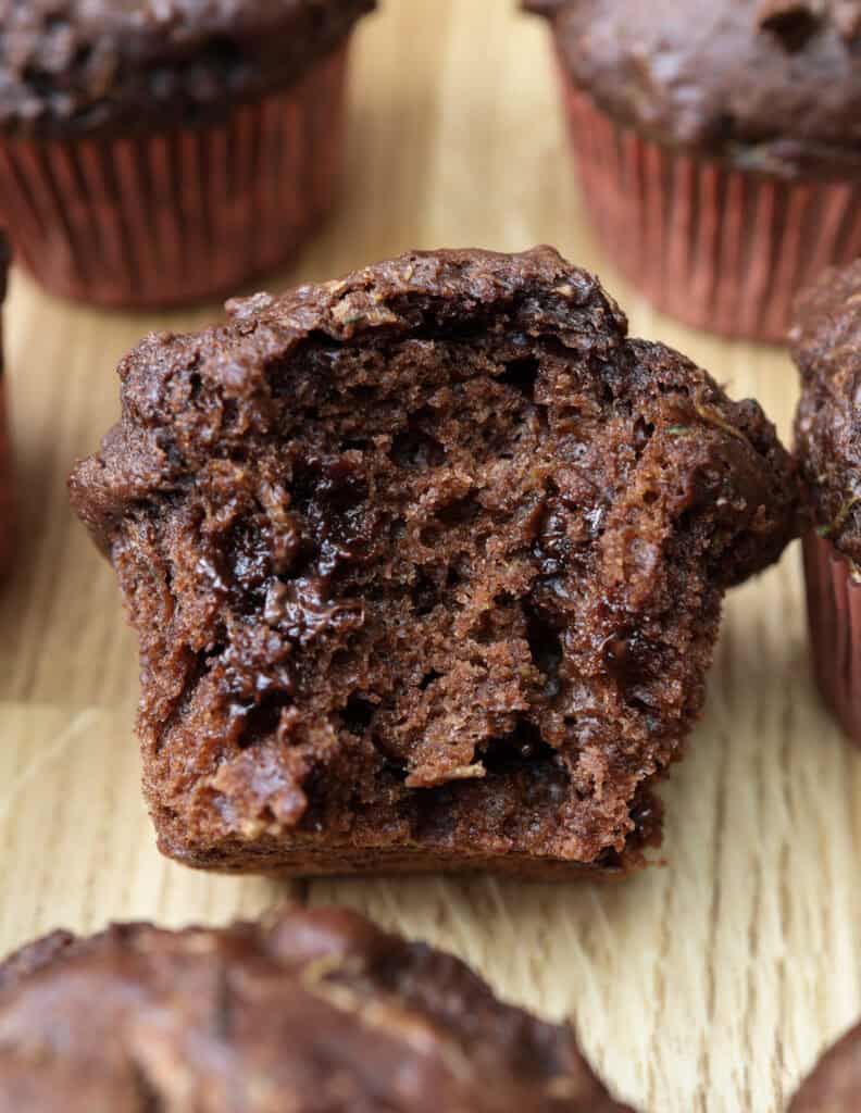 Double Chocolate Zucchini muffin up close with bite.