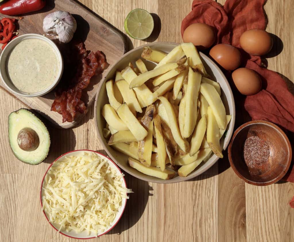 The ingredients needed to make the spicy loaded breakfast fries.