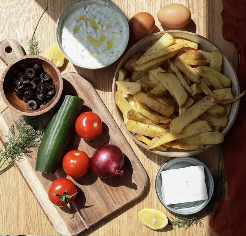Ingredients for Loaded Mediterranean breakfast fries with feta fried eggs