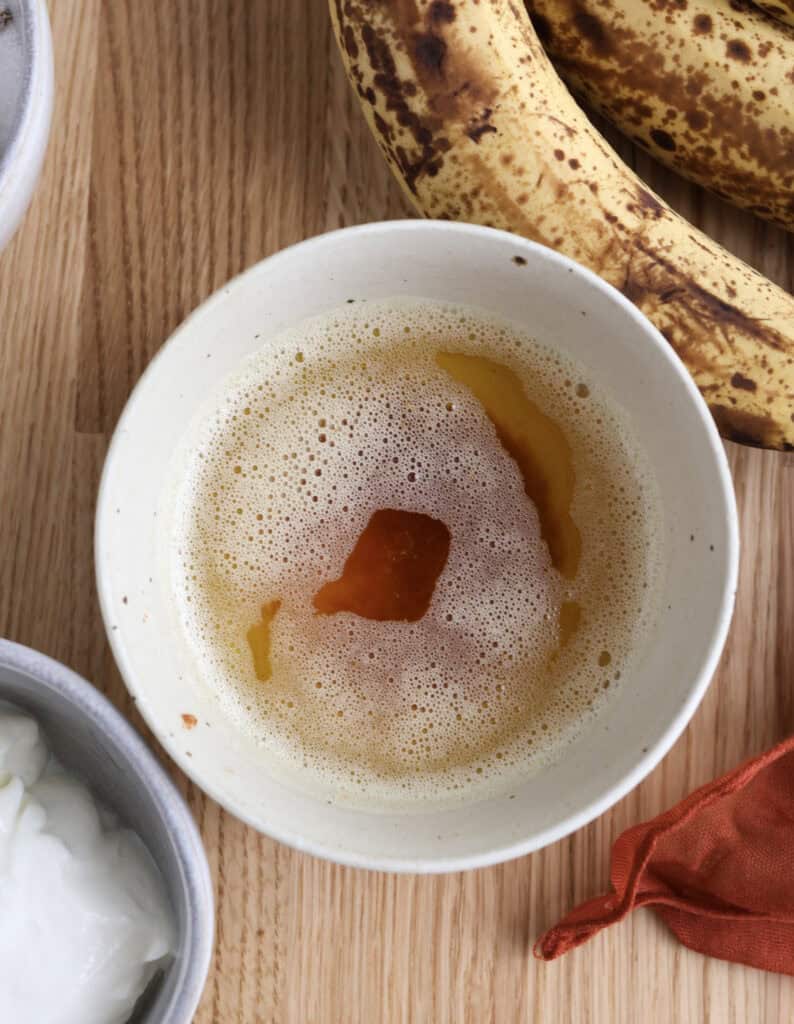 Browned butter in a bowl for the banana bread.