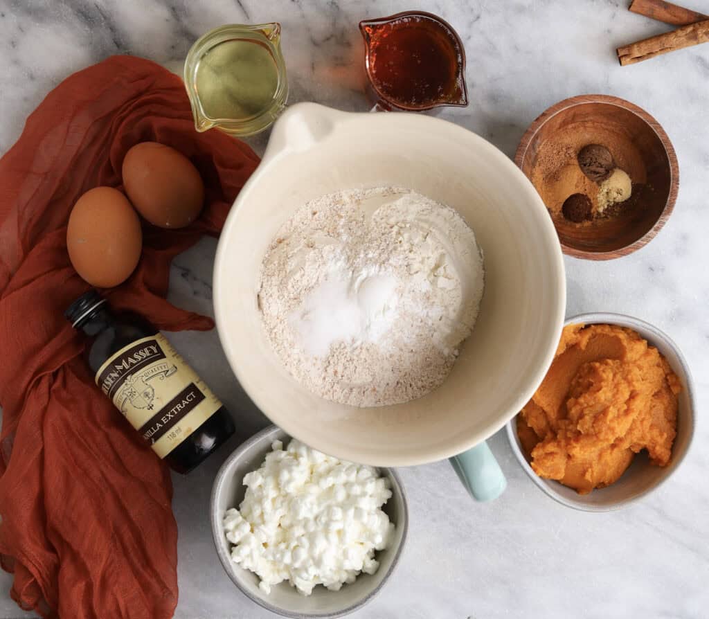 The ingredients needed to make the cottage cheese pumpkin muffins.