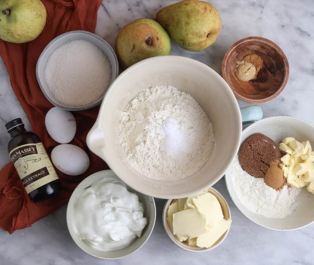 Ingredients for the spiced pear bread on the counter. 