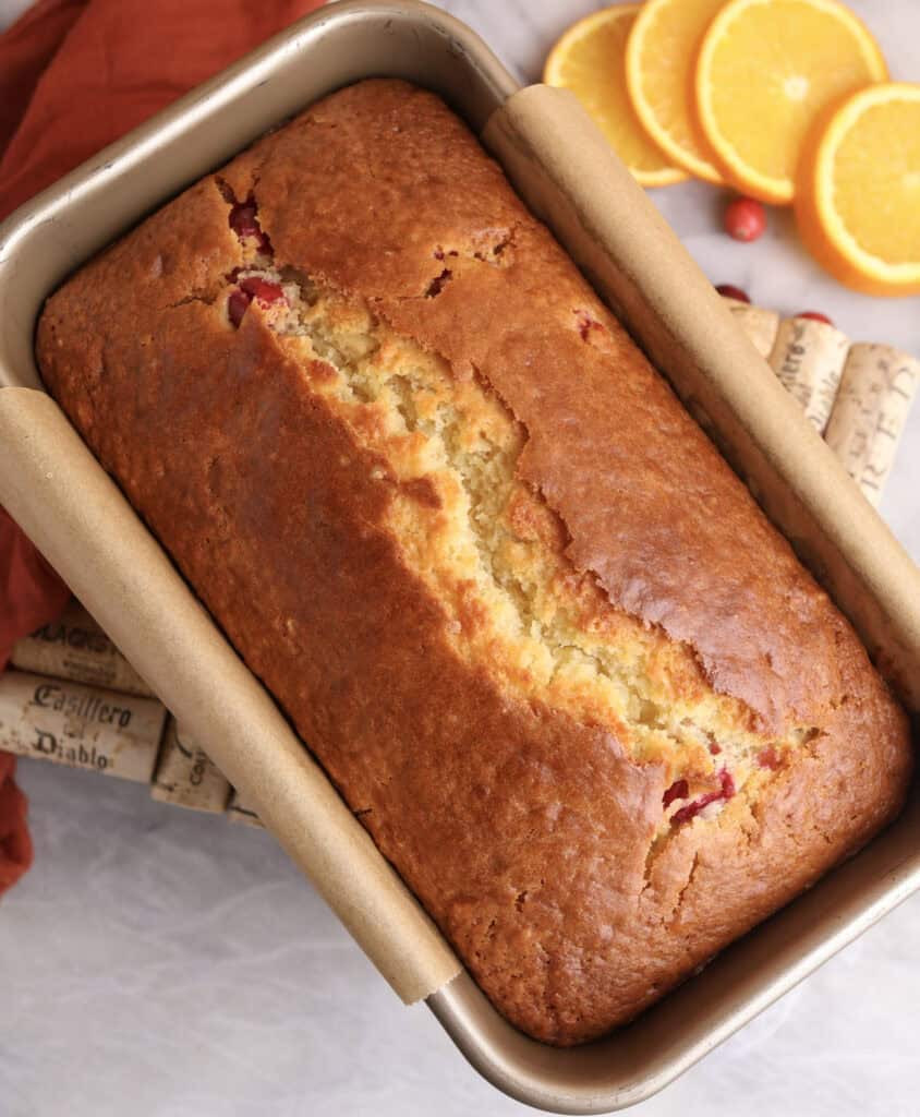 Orange Cranberry loaf right out of the oven still in the loaf pan.
