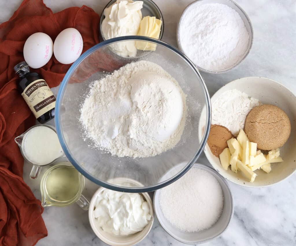 All the ingredients for the cinnamon roll muffins on the counter.